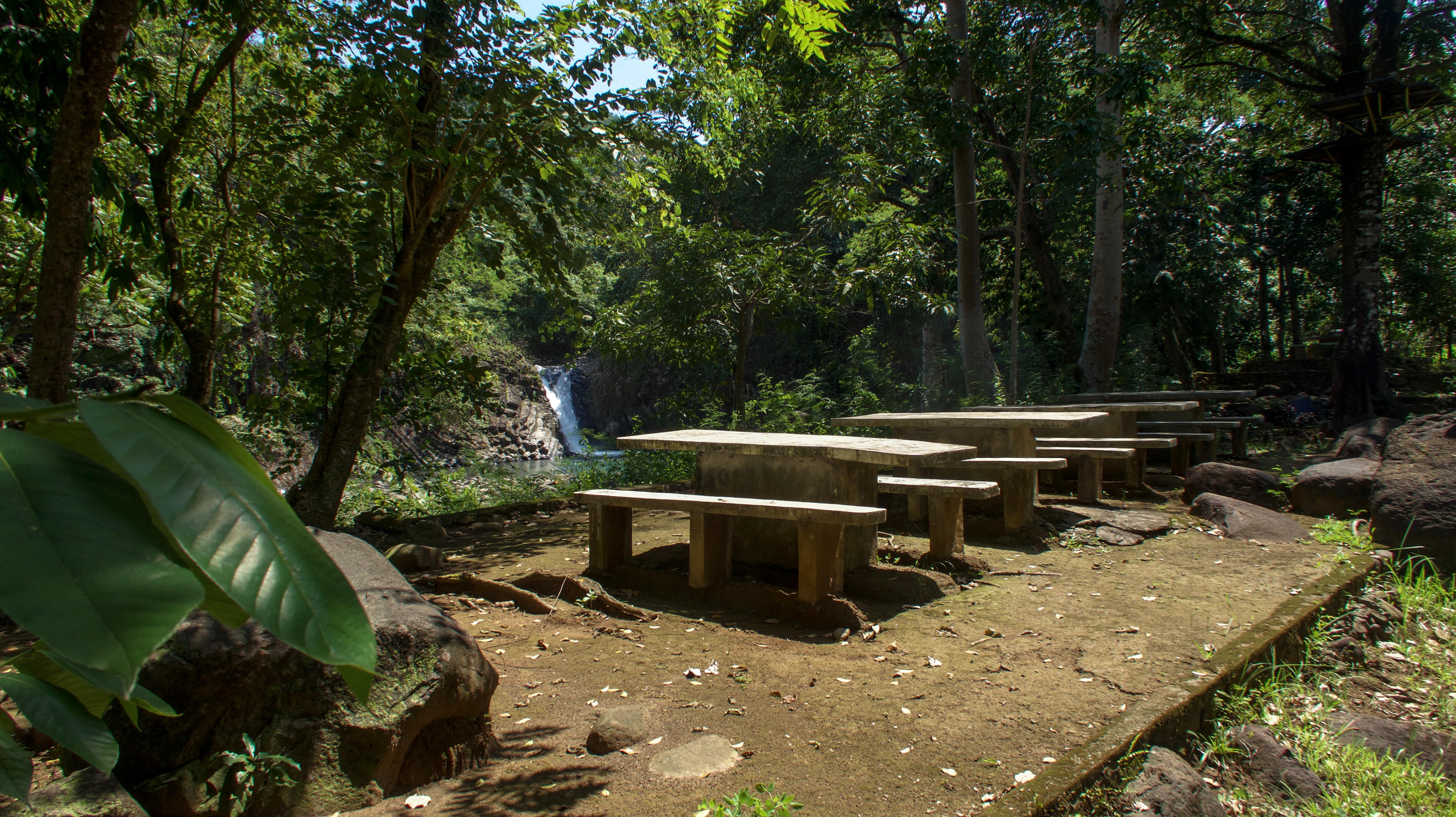 picnic tables at dunsulan falls in bataan philippines